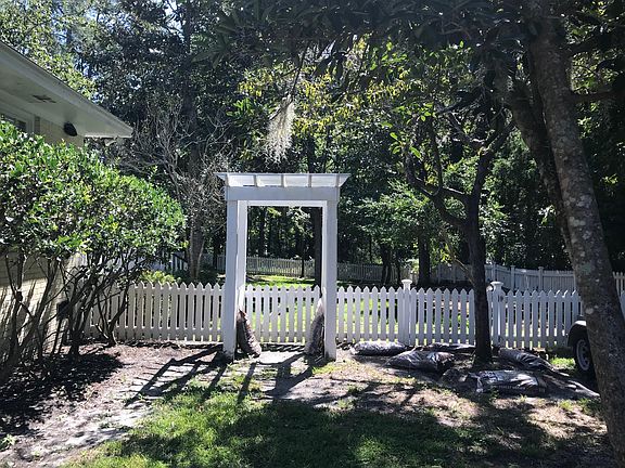 Yard to the right of the house