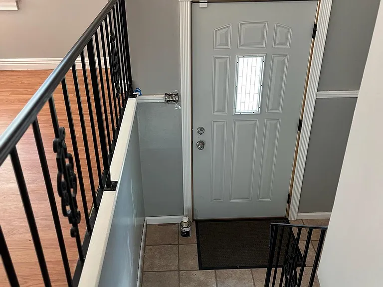 Stairway down to front door