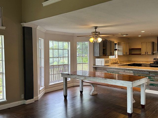 Livingroom area flows drectly into dinning and kitchen space