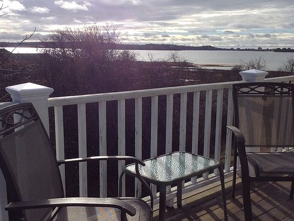 View of New Harbor toward the west
						:
						Quiet beach with small boat storage, swimming, shell fishing directly in front