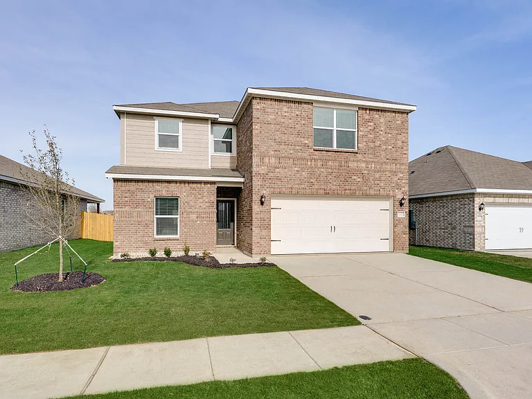 The Cottonwood has an attached two-car garage.