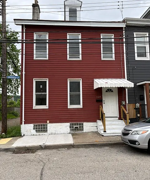 1615 Manhattan St — Photo 1