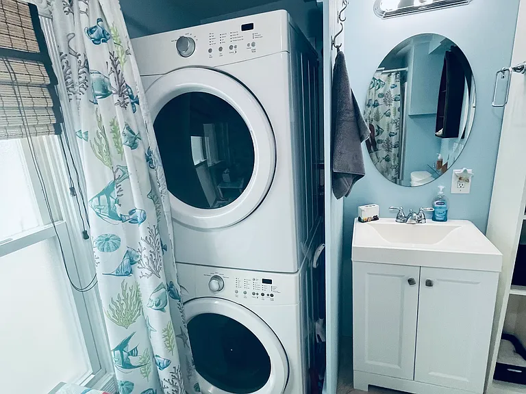 Bathroom with washer and dryer