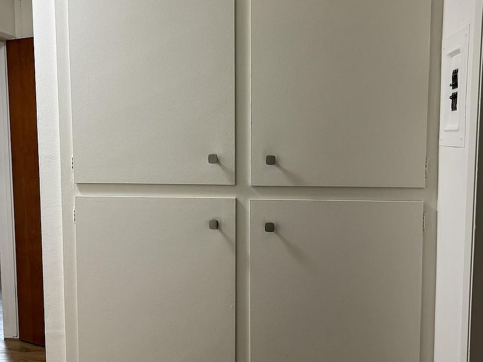 Hallway storage near bathroom and bedroom 2