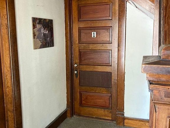 Foyer inside the entrance. Unit 2 is up the stairs.