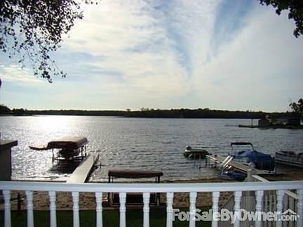 view from lower deck : Sandy beach has ample room for two docks & several lifts