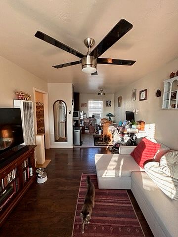 Living Room with Dark 100% Waterproof Vinyl Planks throughout