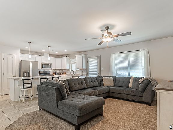 5th image of 10233 E 34th Pl