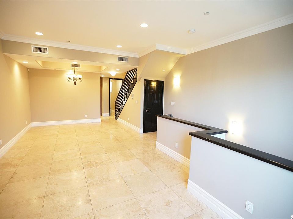 1st image of 18245 Burbank Blvd Unit 104