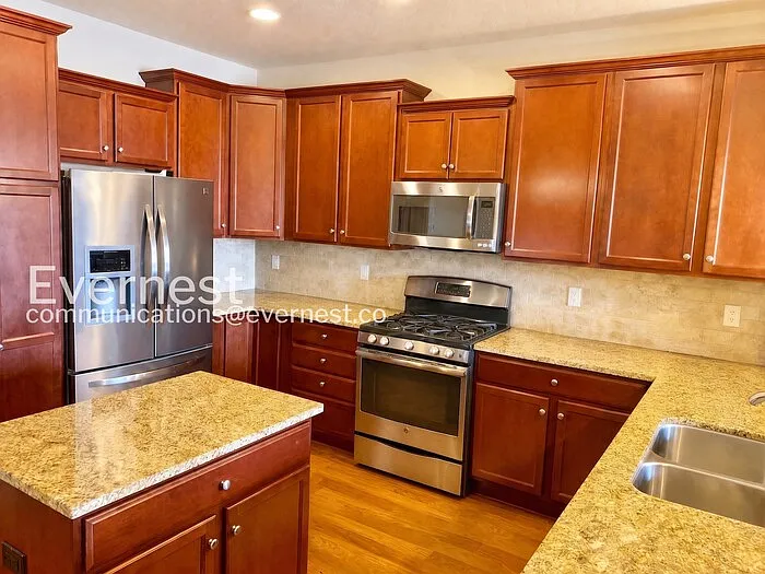 9086 E Phillips Ln — Photo 4
