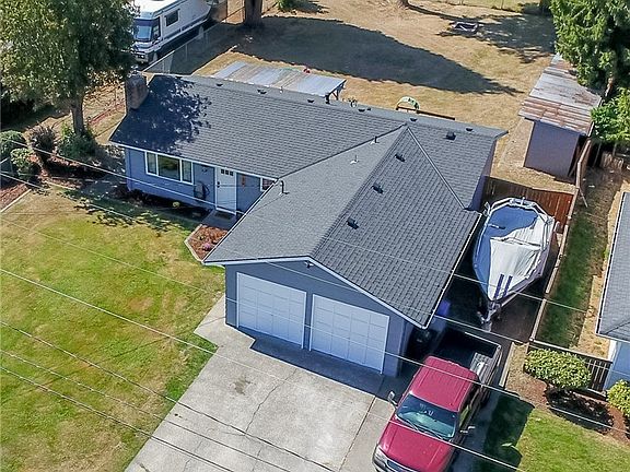 Not only do you have a Mt Rainier view from the front but spacious green space in back!