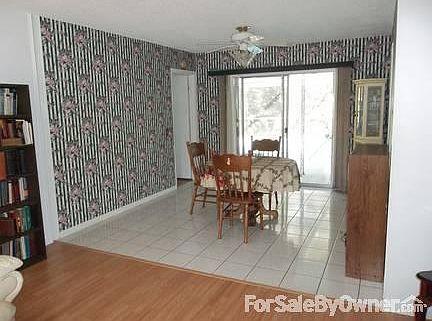 Dining room
						:
						Sliding glass door goes to enclosed pool area.