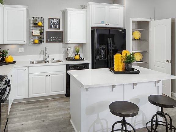 Kitchen with island pantry