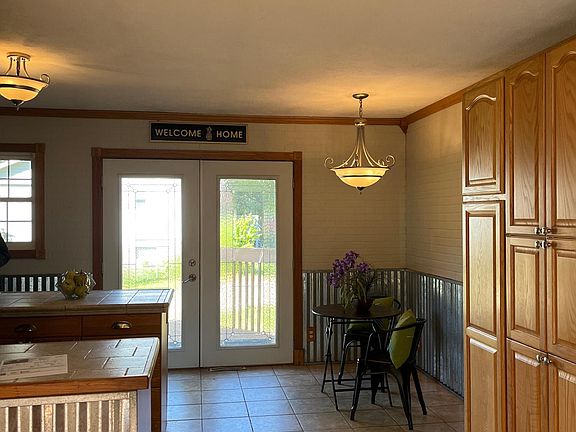 Dining room with French doors to the back deck.