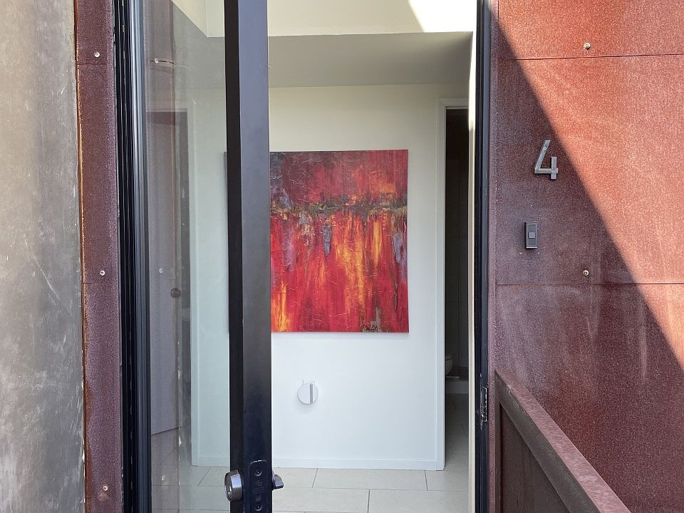 Glass front door to bedroom/bath level