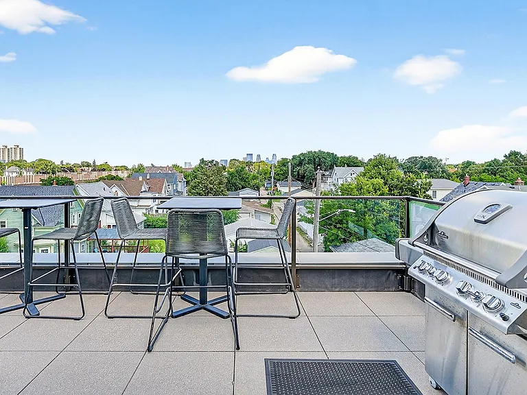 Gather with friends and savor rooftop views while grilling, dining, and relaxing in our inviting outdoor lounge.