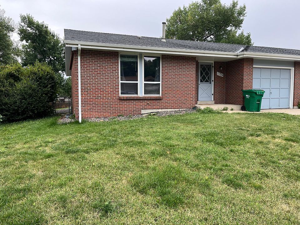 Front of duplex. Has one, oversized 1-car garage.