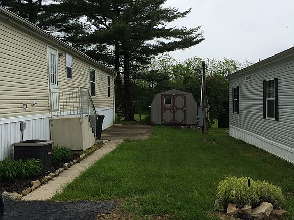 side view with cement patio 