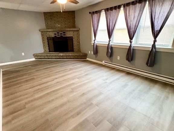 345 Third Street Rear - Large Living Room with Decorative Brick Fireplace