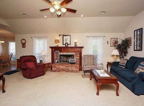 Living Room with Woodburning Fireplace