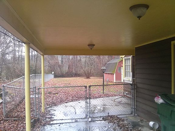 back yard carport area