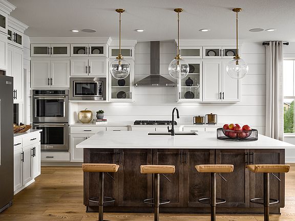 This well-appointed kitchen boasts plenty of cabinetry space