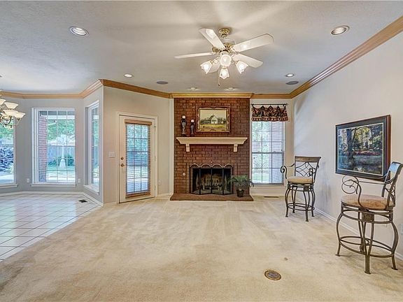Family room adjacent of kitchen dining area. Great for entertaining!