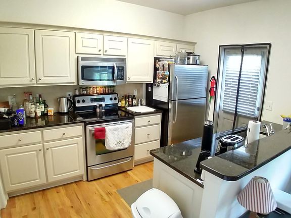 Granite Counters, stainless appliances, hardwood floors throughout