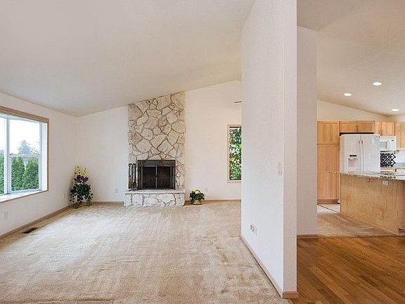 This open and circular floor plan offers spacious entertaining, yet allows you to still have separate living spaces. There is wiring for an outdoor speaker system already in place on the partial wall for you to be able to enjoy your music in your own back yard as well.