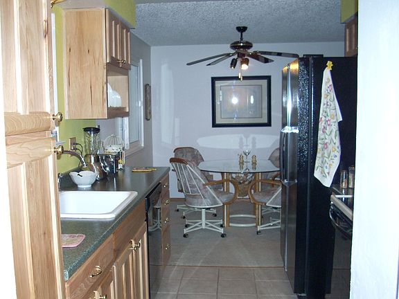 Hickory cabinets/tile floor