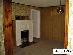 Den has a fire place as well