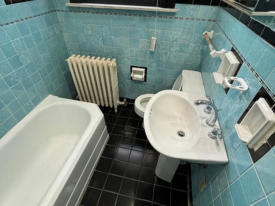 Tiled bath on second floor