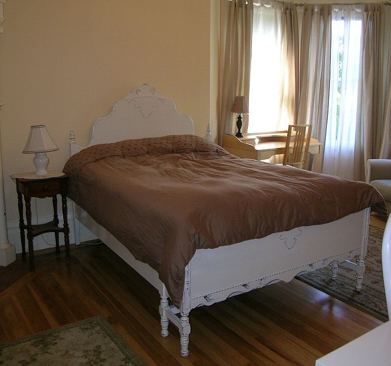 Room 2. Antique bed.