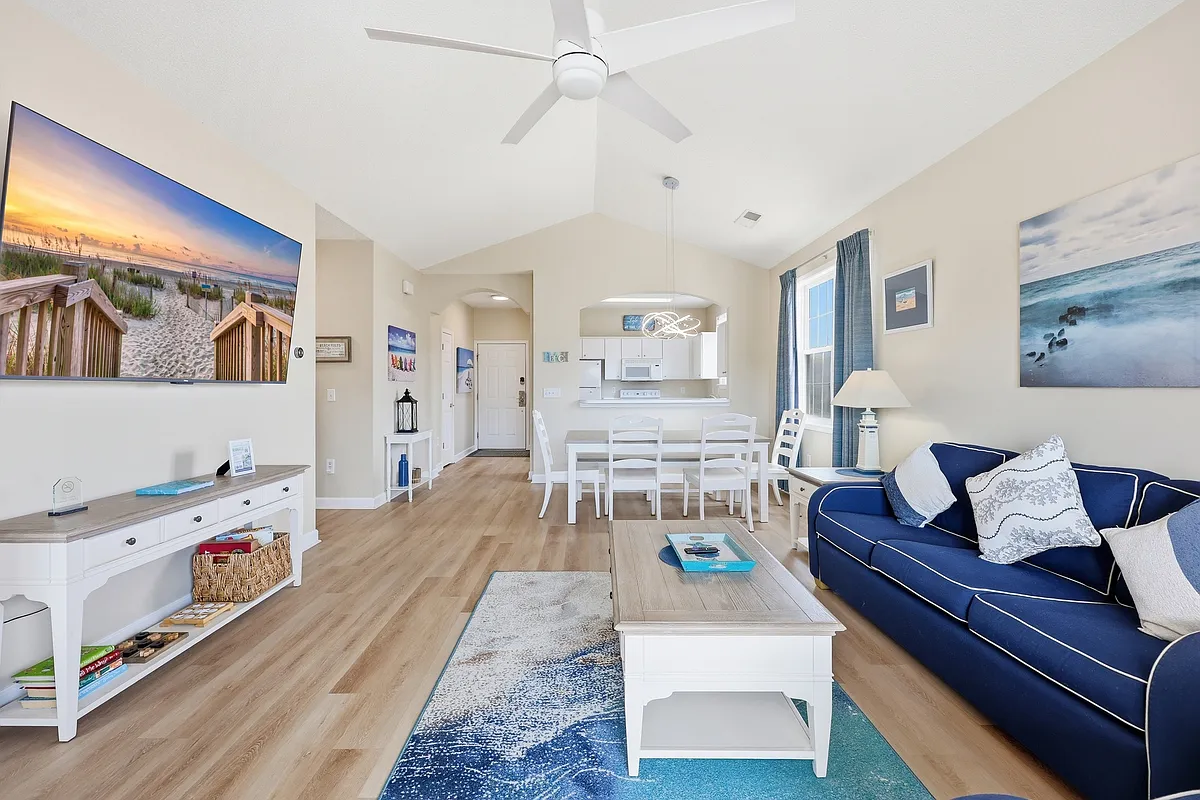 Relax and unwind in this cozy living space after a day of exploring. - 5751 Oyster Catcher Dr #831