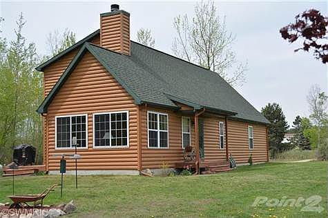Wow! What a house! And it's vinyl. Located on 2 Wooded Acres.