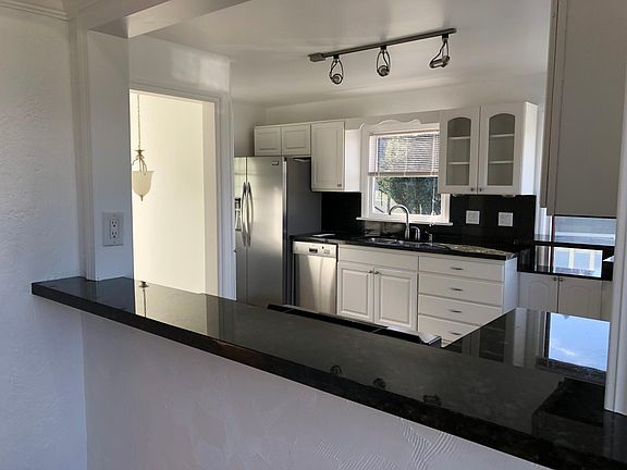 Beautifully updated kitchen w/ bar seating