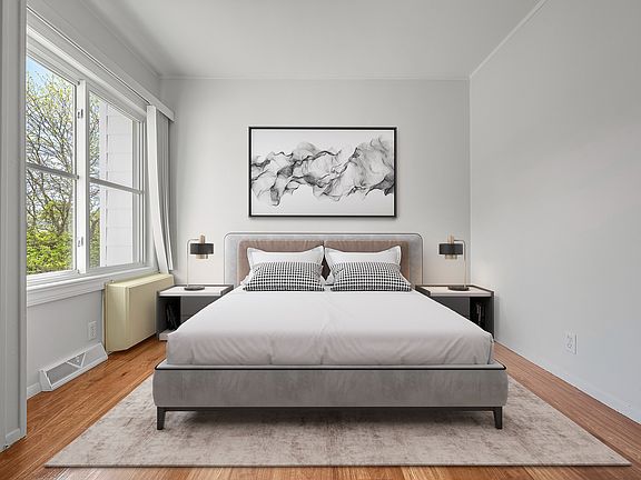 Bedroom #2 - from a front view near doorway with bed and decor ( VS)1