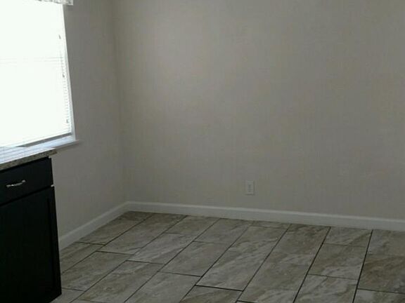 Tile floor dining area.