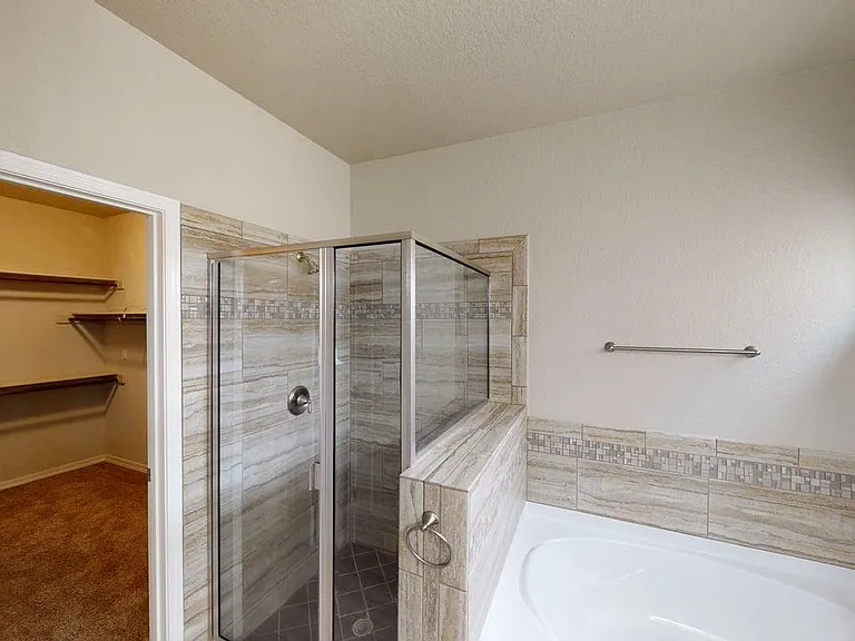 Elegant Primary Bath with Walk-in Closet and Separate Shower