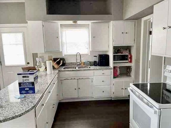 Newly renovated kitchen with granite countertops and new appliances