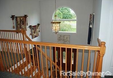 Cathedral Entry Foyer
						:
						Entry Foyer (12x12.5) with cathedral ceiling, tile floor