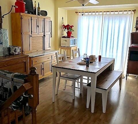 More kitchen w slider to a spacious deck!