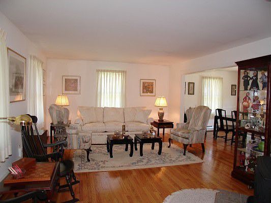 Large living room with woodstove