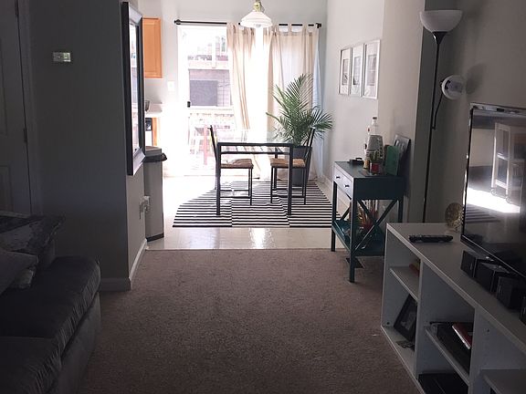 Living Room facing Dining Room to Deck