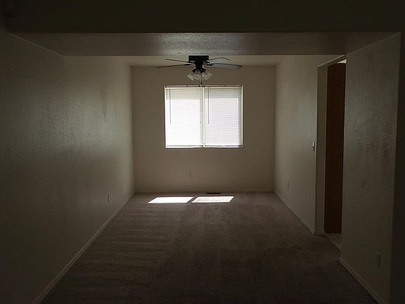 Formal dining room, door to kitchen is on the right.