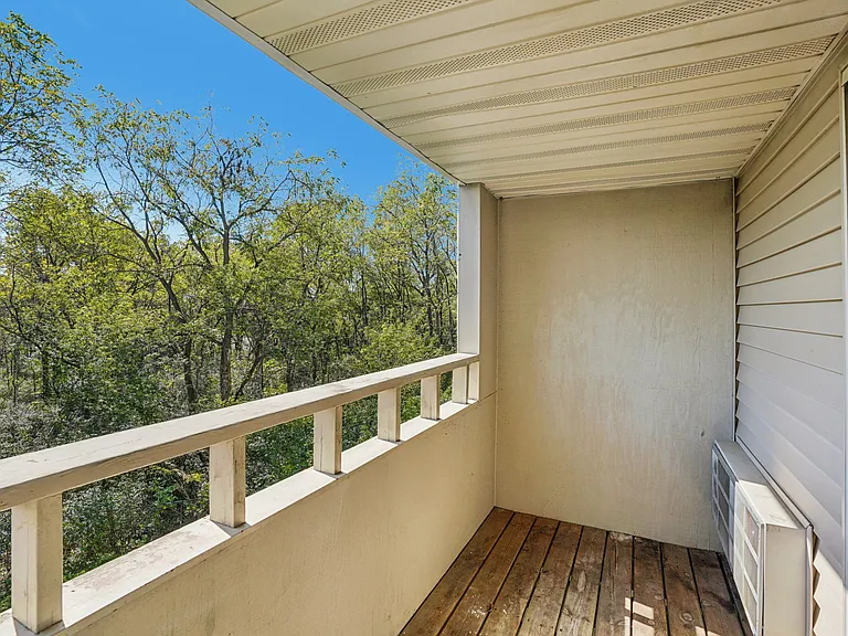 Enjoy your morning coffee on private balconies overlooking peaceful tree-lined views, professionally operated by Highlands Vista Group.