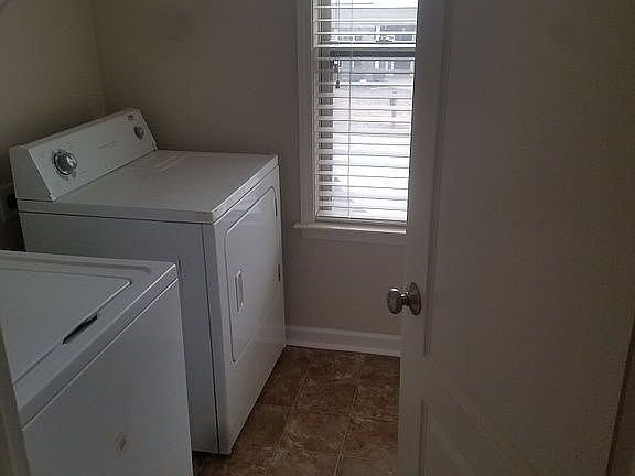 Upstairs washer and dryer room