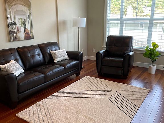 Living room off kitchen with TV