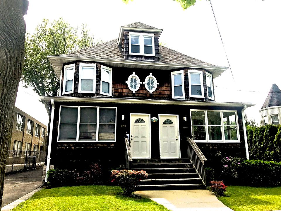 Front of Duplex, unit on right is available
