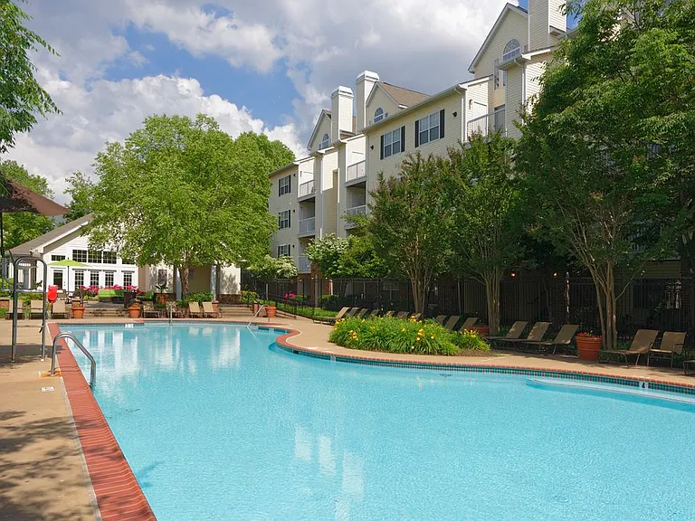 Courtyard with swimming pool and sundeck with lounge seating